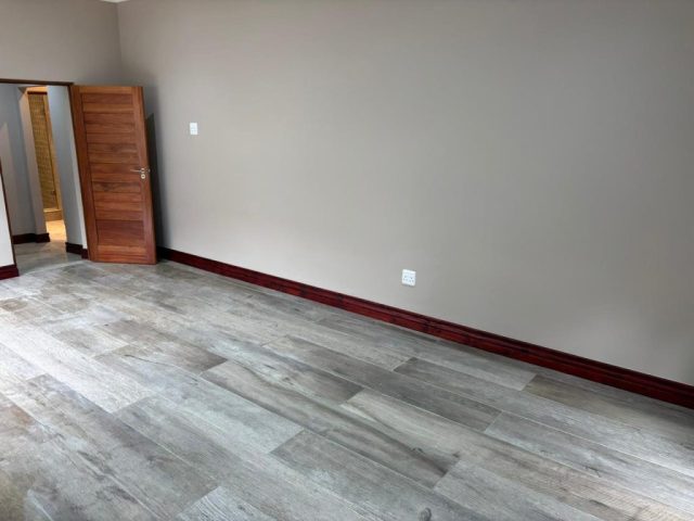 Bedroom floor tiles and wood skirting Aksium Projects
