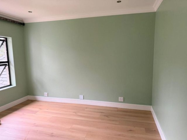 Room finishing with green paint Aksium Projects